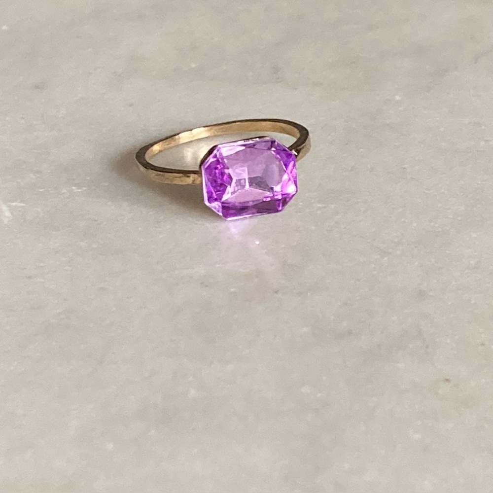 Gold Ring with Purple Gemstone